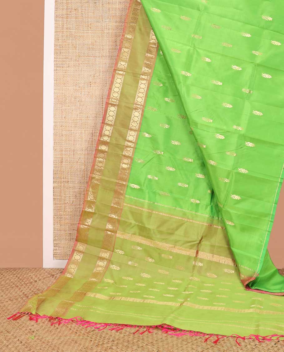 Green buttas kancheepuram silk saree with contrast rettai pettu border of rekku, banaras, poo chakram design & zari design pallu