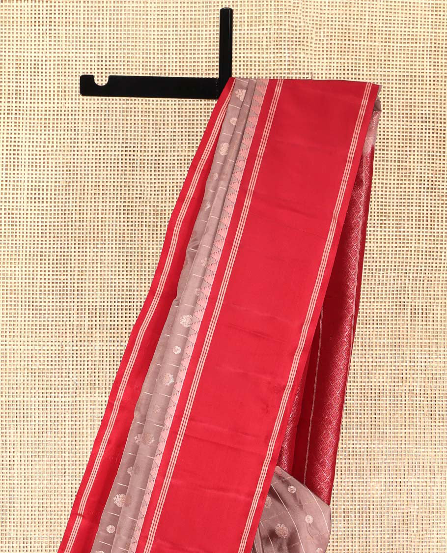 Pale Brown Kanchipuram Silk Saree, Delicately Woven with Iruthalaipakshi Butta Enclosed Checks on Its Body, Complemented by a Contrast Temple Border, Sparsely Woven Jaal Pallu, and Paired with a Contrast Blouse