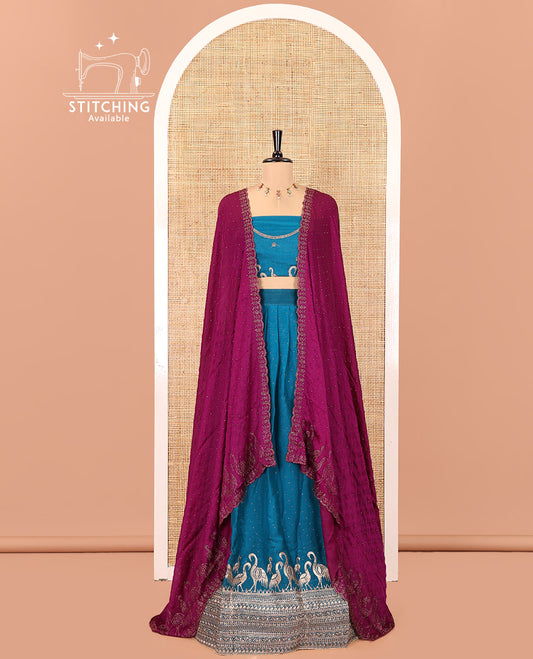 Blue Half-Saree Set, Mesmerized with Stone Work and Bird Motifs Embroidery on Its Satin Georgette Skirt, Highlighted by Embroidered Border, Paired with a Matching Blouse, and Comes with a Contrast Scallop Stone Work Dupatta