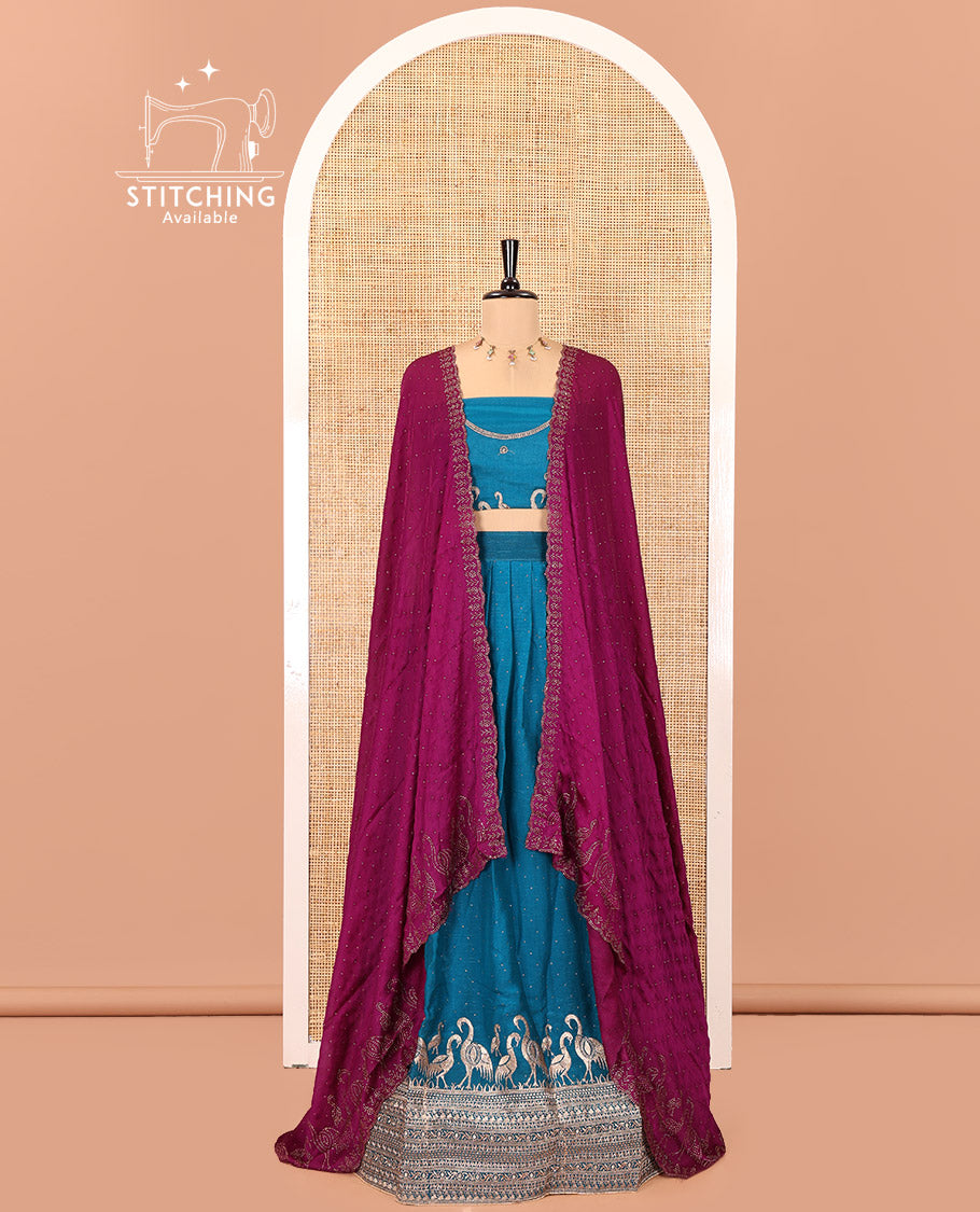 Blue Half-Saree Set, Mesmerized with Stone Work and Bird Motifs Embroidery on Its Satin Georgette Skirt, Highlighted by Embroidered Border, Paired with a Matching Blouse, and Comes with a Contrast Scallop Stone Work Dupatta