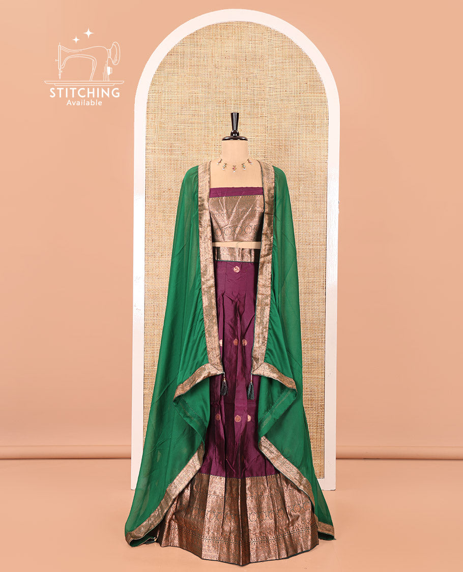 Purple and Green Semi-Banarasi Half-Saree, Elevated with Zari Buttas on Its Skirt, Complemented by a Contrast Traditional Zari-Design Border, Paired with a Matching Blouse, and a Contrast Satin Georgette Zari-Bordered Dhavani