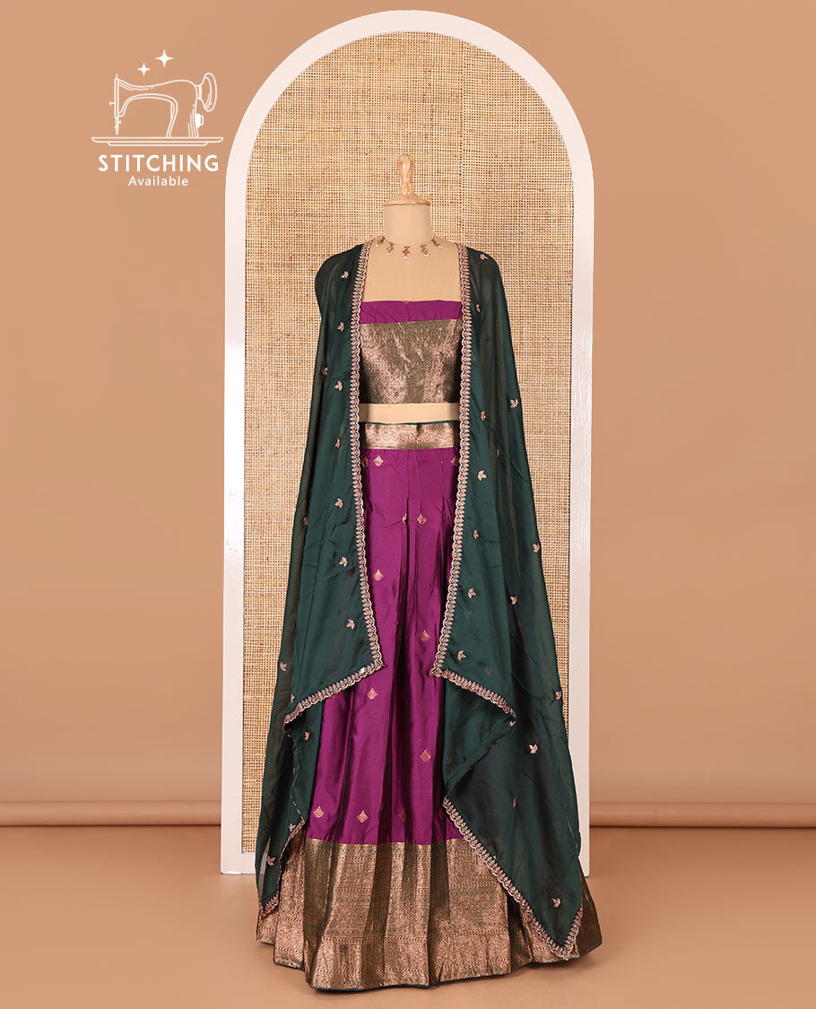 Violet taffeta silk half-saree, zari buttas and contrast traditional zari bordered skirt, a matching blouse, and contrast embroidered satin georgette  dhavani