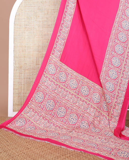 Rani pink modal crepe saree with ajrakh printed border & ajrakh printed pallu along with printed blouse