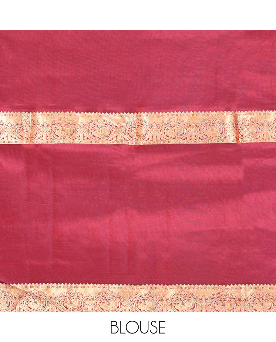 Orange Vasundhara Lite Silk Mix Saree, Subtly Sparkled with Zari Buttas All Over Its Body, Complemented by a Contrast Border of Thilakam, Kamalam, and Round Mayil Designs, Intricately Designed Pallu, and Paired with a Contrast Blouse