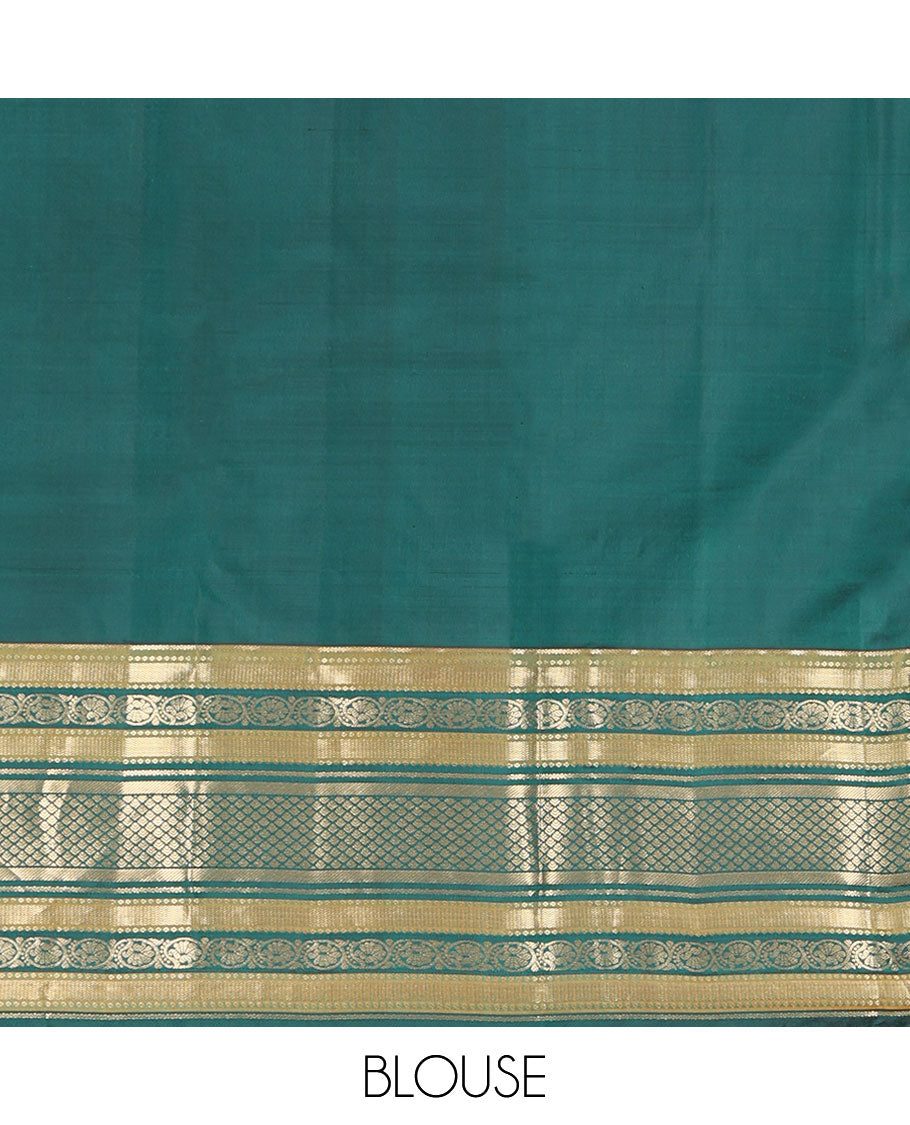 Green Kanchipuram Silk Saree, Detailed with Buttas on Its Body, Complemented by a Contrast Border of Vanki, Kodi Visiry, Neli, Banaras, and Jaal Designs, Grandly Jaal Woven Pallu, and Paired with a Contrast Blouse