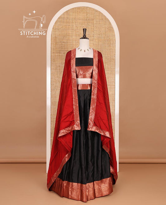 Black taffeta silk half saree, zari buttas with contrast red traditional zari border skirt, matching zari design blouse, and contrast plain zari border syska georgette dhavani