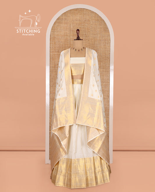 Cream Banarasi Silk Half-Saree Features a Plain Skirt, a Traditional Border, Matching Blouse, and Zari-Woven Dhavani