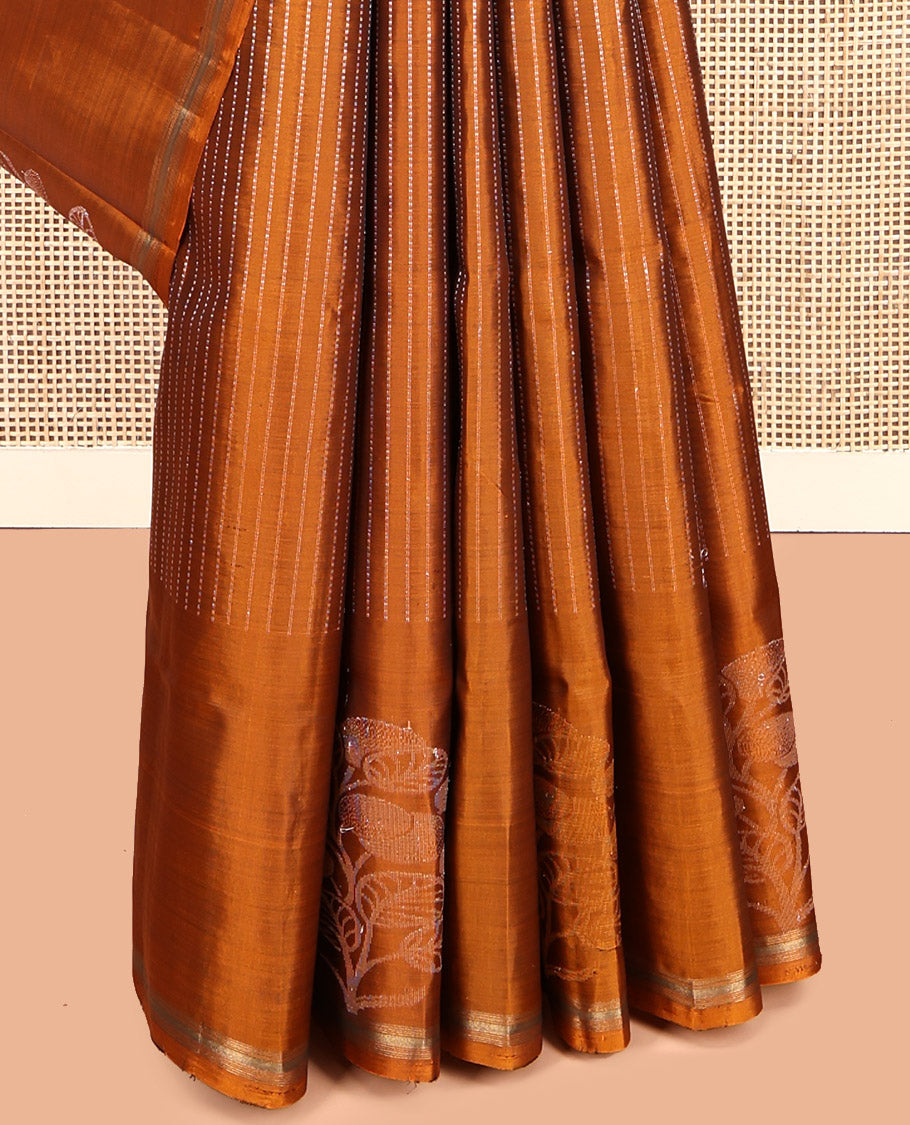 Orange Mayuri Lite Silk Mix Saree, Adorned with Zari Stripes and Floral Buttas, a Zari Piping Border, Pallu of Leaf Vine and a Matching Blouse