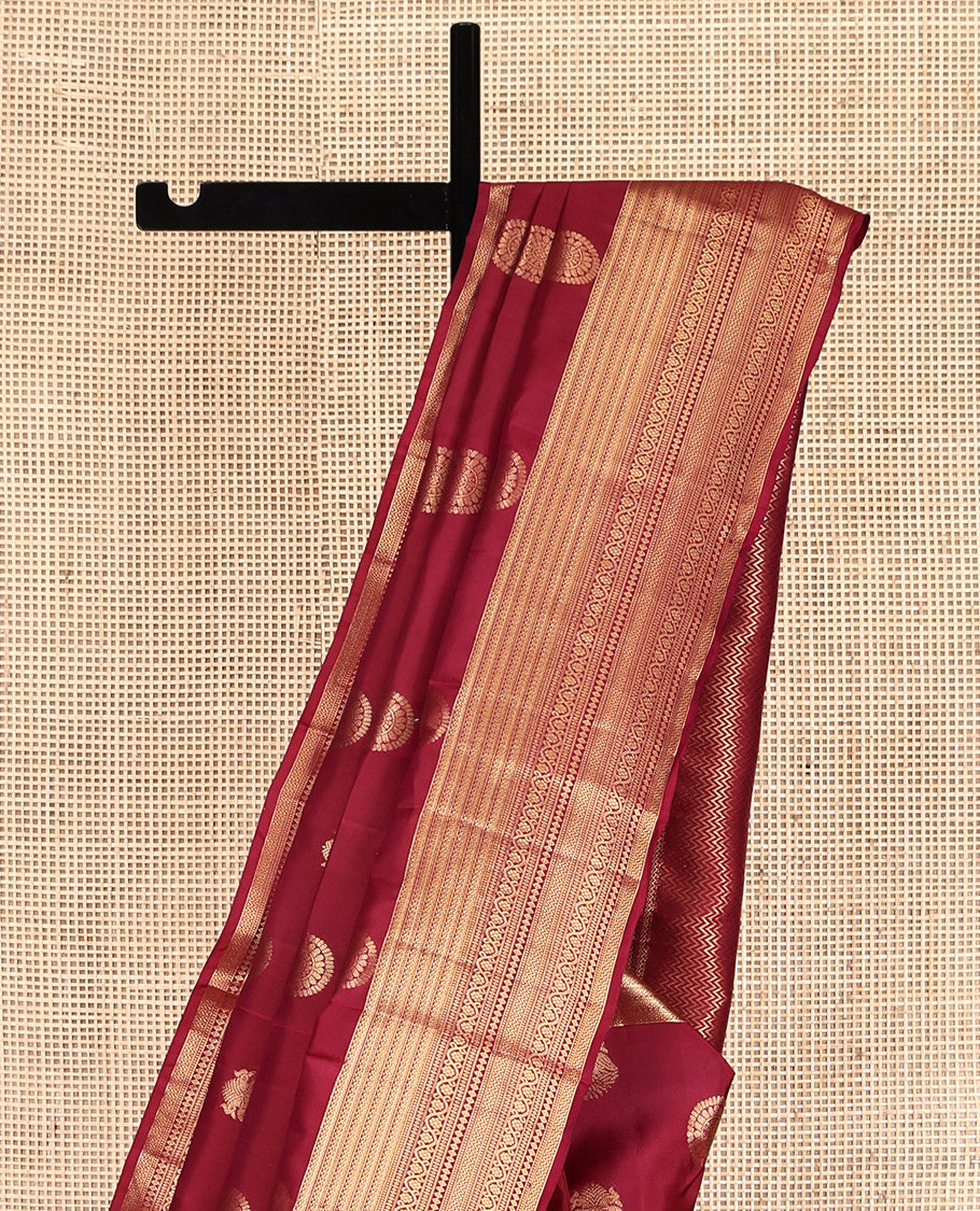 Red Vasundhara Lite Silk Mix Saree, Mesmerized with Iruthalai-Pakshi and Chakram Buttas, a Traditional Zari Border, Vanki Design Pallu, and a Matching Blouse
