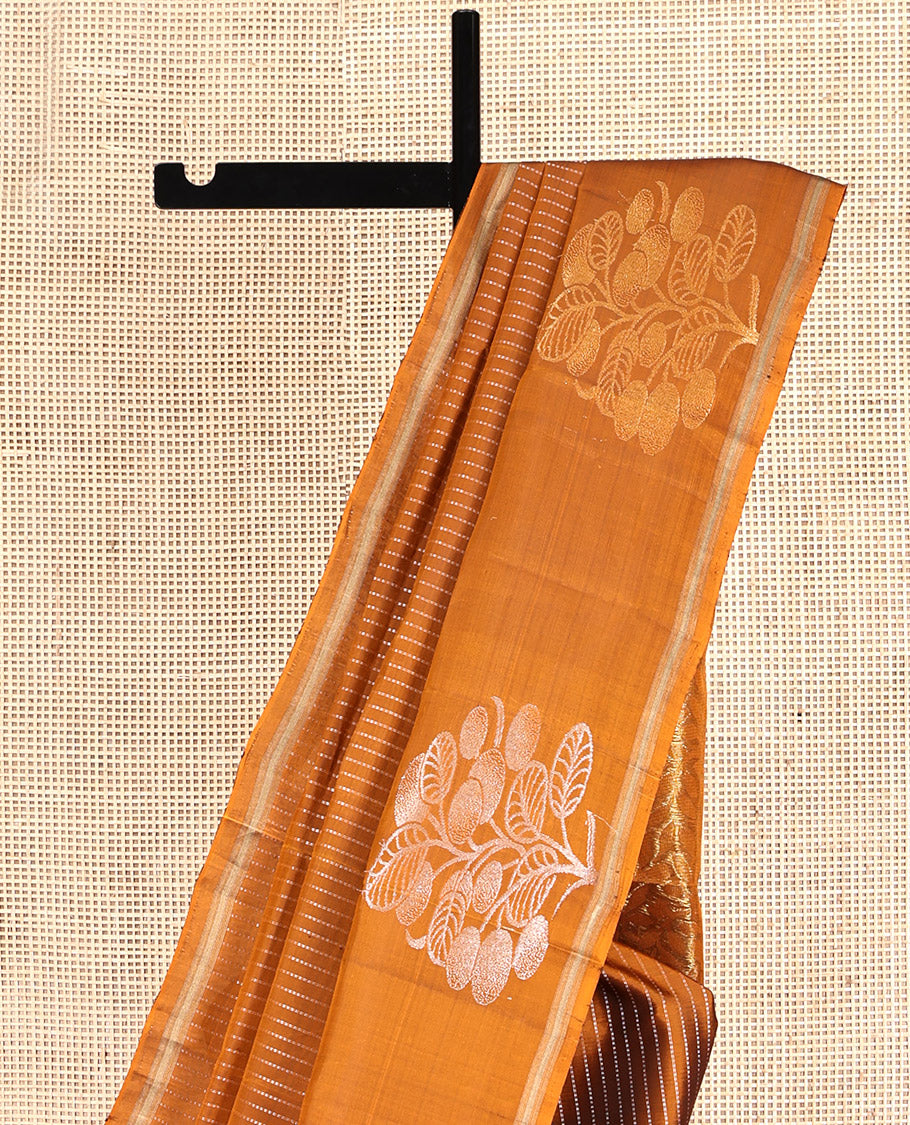 Orange Mayuri Lite Silk Mix Saree, Adorned with Zari Stripes and Floral Buttas, a Zari Piping Border, Pallu of Leaf Vine and a Matching Blouse