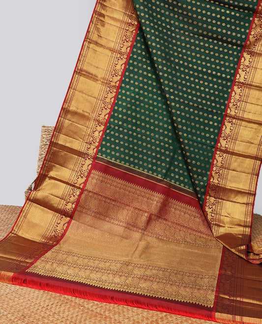 Green zari buttas Kanchipuram silk saree, contrast zari border of kuthirai design & pallu of rekku,poun,mayil & zari design