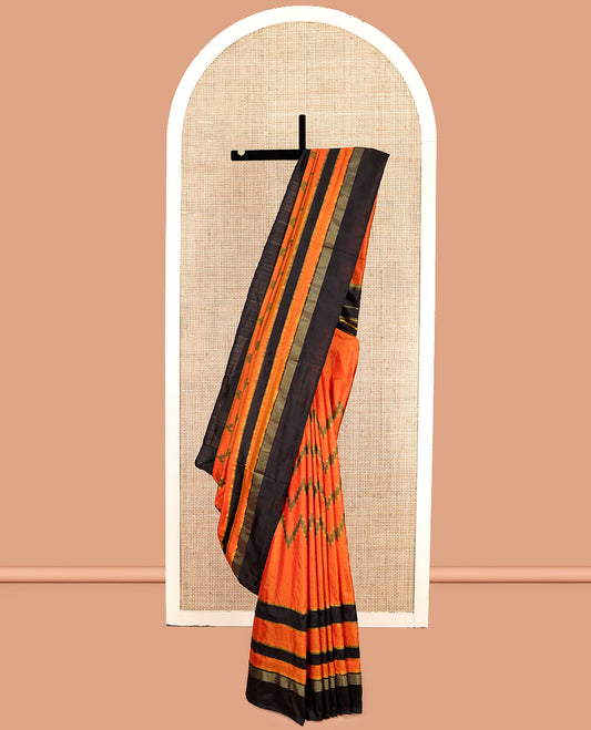 Orange Pochampally Ikat Silk Saree, Decked Up with Chevron Stripes, Complemented by a Contrast Border, Chevron Striped Pallu, and a Contrast Blouse