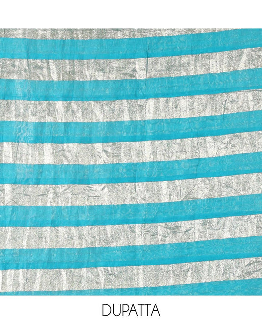 Blue material chudidar set, plain with pom-pom tasseled mul chanderi top, a matching bottom, and organza dupatta of stripes