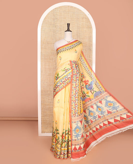Yellow floral-theme printed saree, colorful floral motifs printed border, and intricate pallu