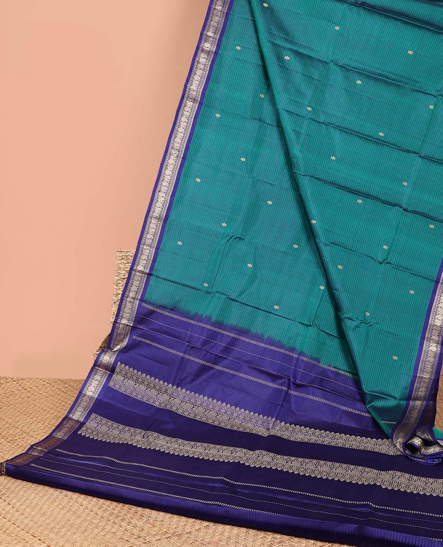 Blue striped flower buttas kancheepuram silk saree with contrast border of sombu, banaras, paisley design & zari design pallu
