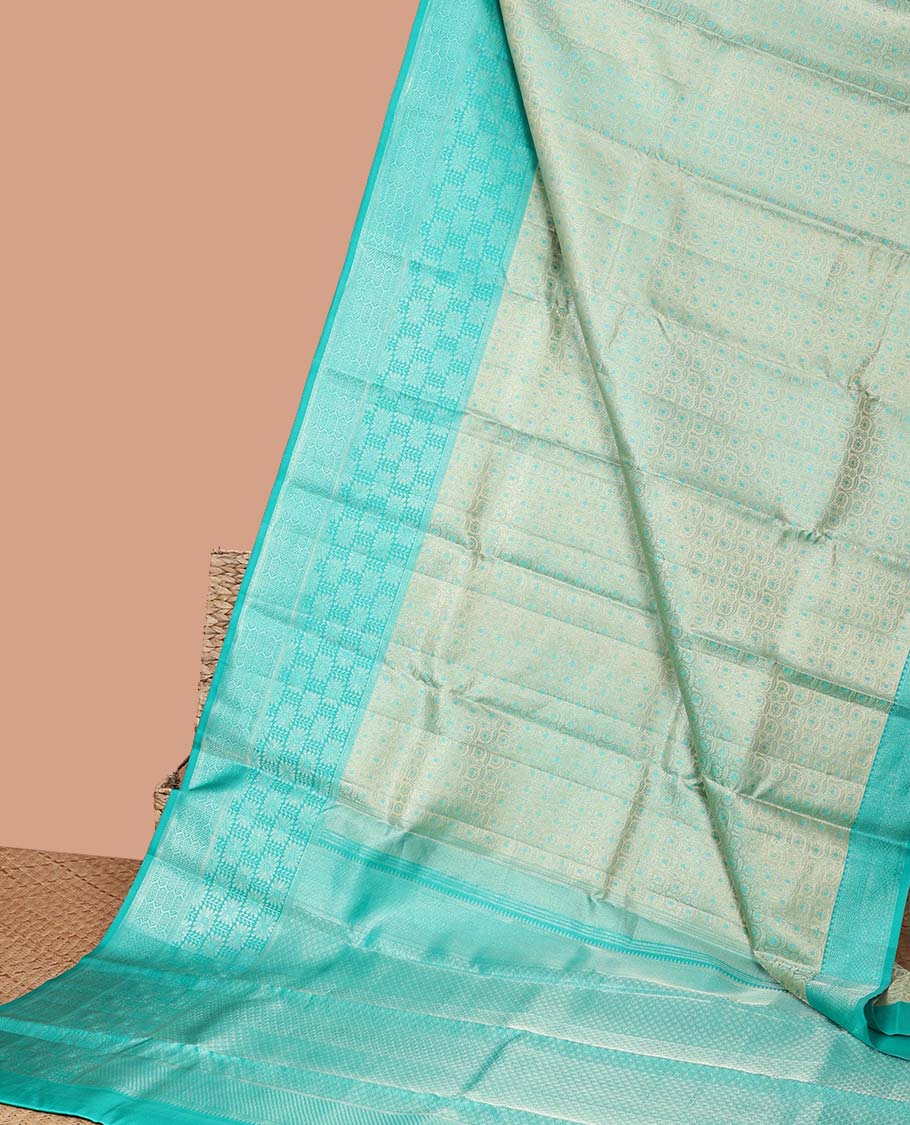Green checked kancheepuram silk saree with contrast zari design border & pallu od argyle pattern