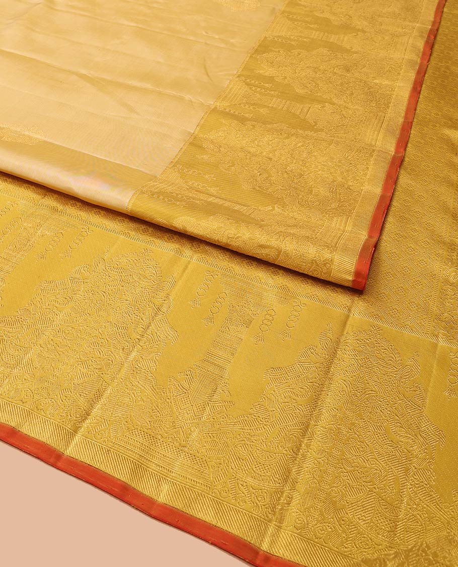 Sandal Kanchipuram Designer Silk Saree, Gracefully Embellished with Buttas All Over Its Body, Complemented by a Contrast Border of Mayil, Kuthirai, Yaali, and Pichwai Cow Designs, Grandly Woven Jaal Pallu, and Paired with a Contrast Blouse