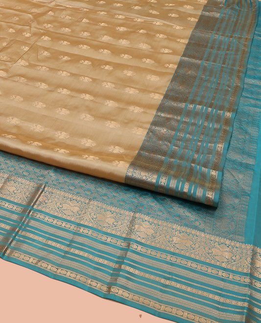 Gold Vasundhara Lite Silk Mix Saree, Bedecked with Iruthalai Pakshi Zari Buttas, Complemented by a Contrast Border of Rekku, Iruthalai Pakshi, Muthu, Laddu Kamalam, and Rudraksham, Opulently Embellished Pallu, and Paired with a Contrast Blouse