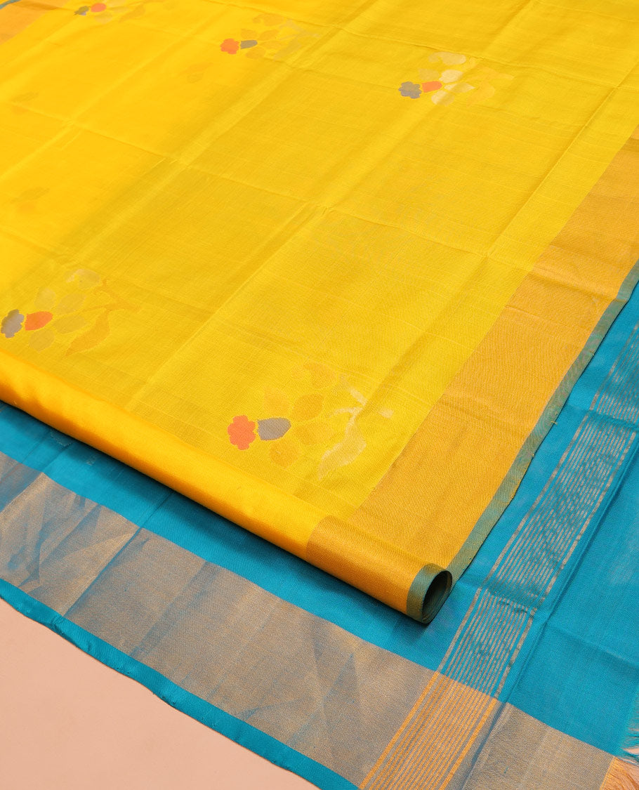 Yellow Uppada Silk Saree, Prettified with Floral Meena Buttas All Over Its Body, Subtle Plain Border, Complemented  by Contrast Pallu Steeped with Floral Meena Buttas, and Paired with a Contrast Blouse