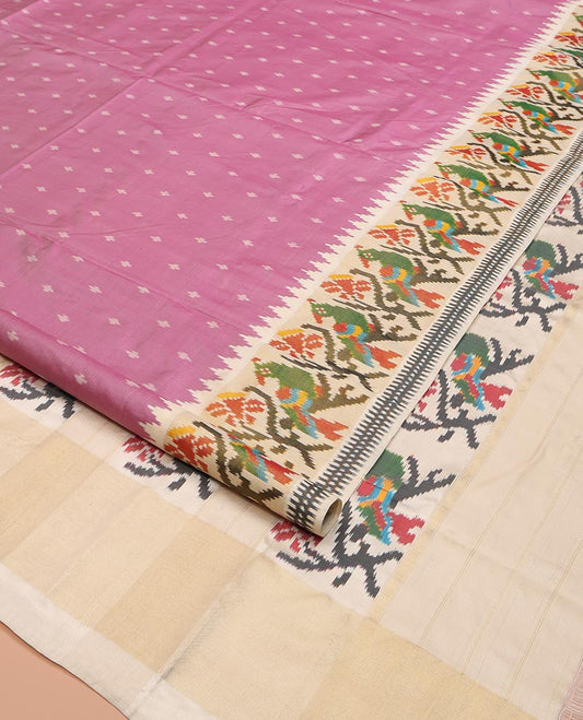 Pink Ikkat Silk Saree, Enthralled with Buttas All Over Its Body, Complemented by a Contrast Temple Border of Floral-Parrot Designs, Pallu of Floral-Parrot Designs, and Paired with a Contrast Blouse