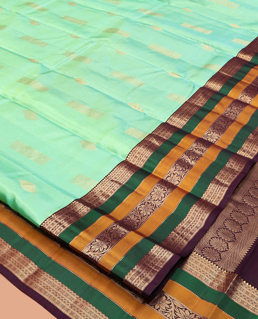 Sea Green Vasundhara Silk Saree, Elevated with Zari Buttas, Contrast Traditional Kodi Visiry Border, Grand Jaal Pallu, and a Contrast Blouse