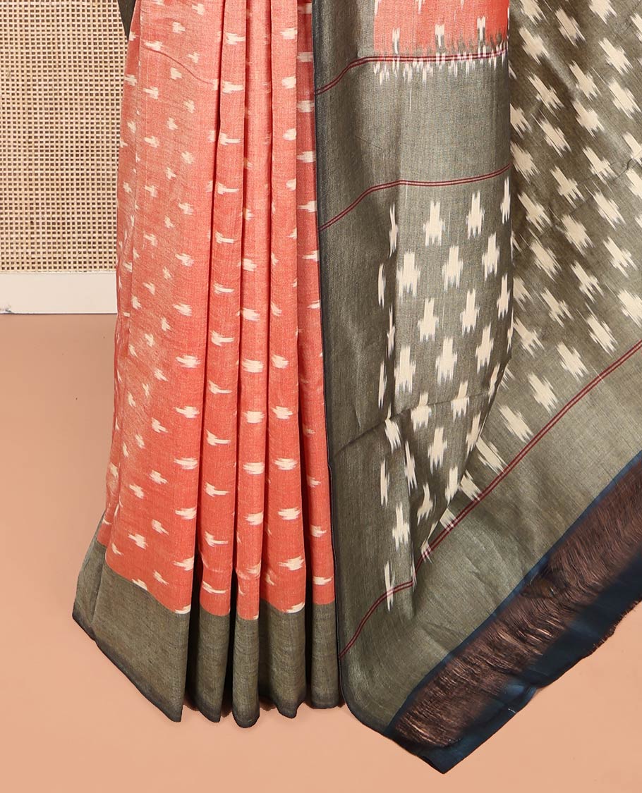 Orange Ikkat Cotton Saree, Embellished with Buttas on Its Body, Complemented by a Contrast Border, Pallu of Ikkat-Style Buttas, and Has No Blouse