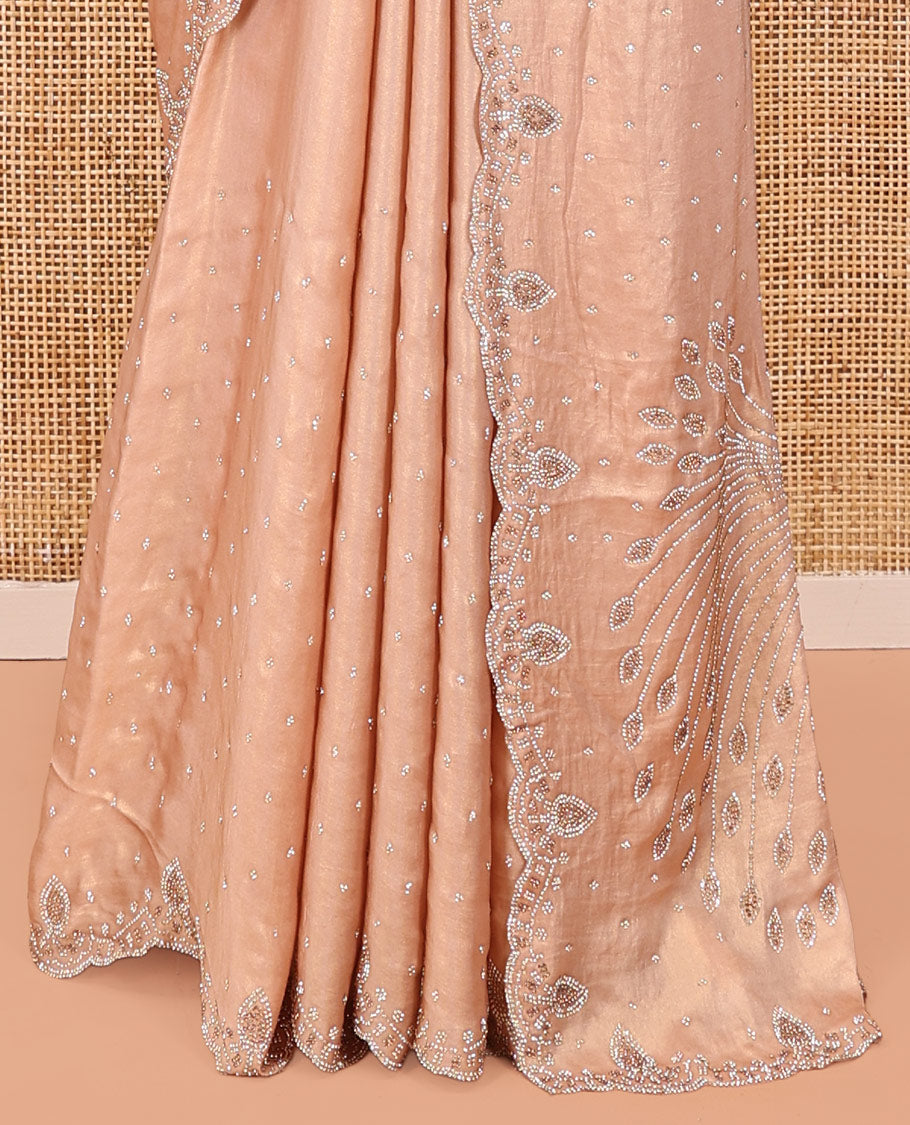 Champagne Designer Saree Gleamed up with Stone Work On Its Body, Scallop Embroidered Border, and Paired with a Heavy Embroidered Matching Blouse