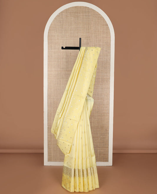Lemon yellow floral motifs raw mango silk saree with self zari design & floral design pallu
