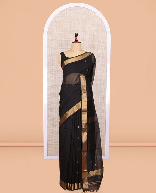 Black Maheshwari Cotton Saree, Accentuated with Buttas, Highlighted by a Traditional Zari Border, Pallu Gleamed Up with Zari Buttas,  and a Matching Blouse