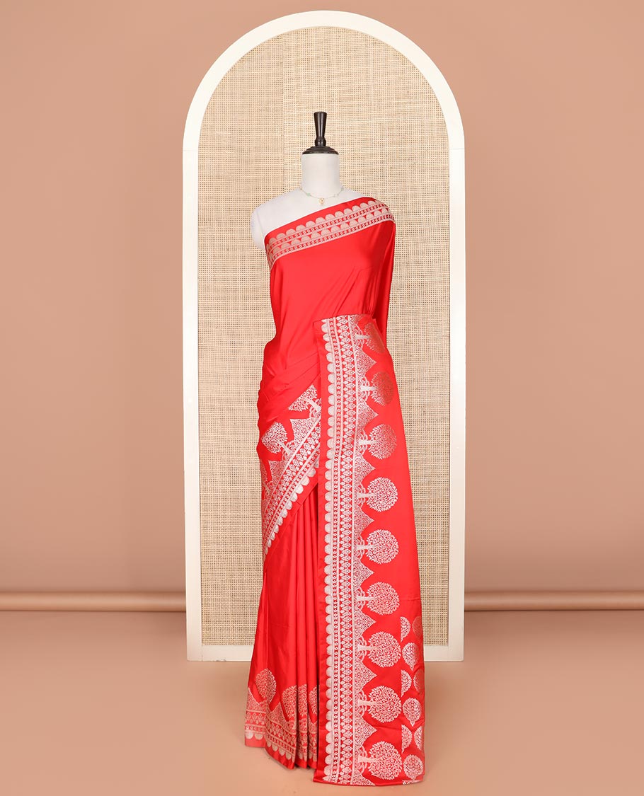 Red plain mushru silk saree, self-border of scallop design, floral, and tree motifs, and intricately designed pallu