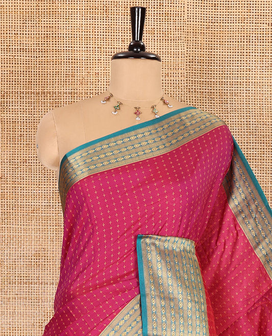 Rani pink thread butta all over body semi soft silk , contrast traditional border , contrast lining chit pallu