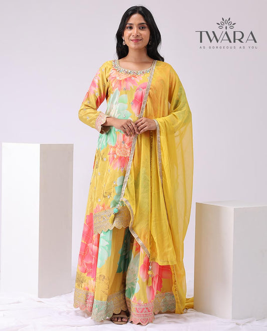 Yellow floral printed, embroidered round neck, 3/4/ th sleeve, knee lenght with floral print palazo & embroidered dupatta