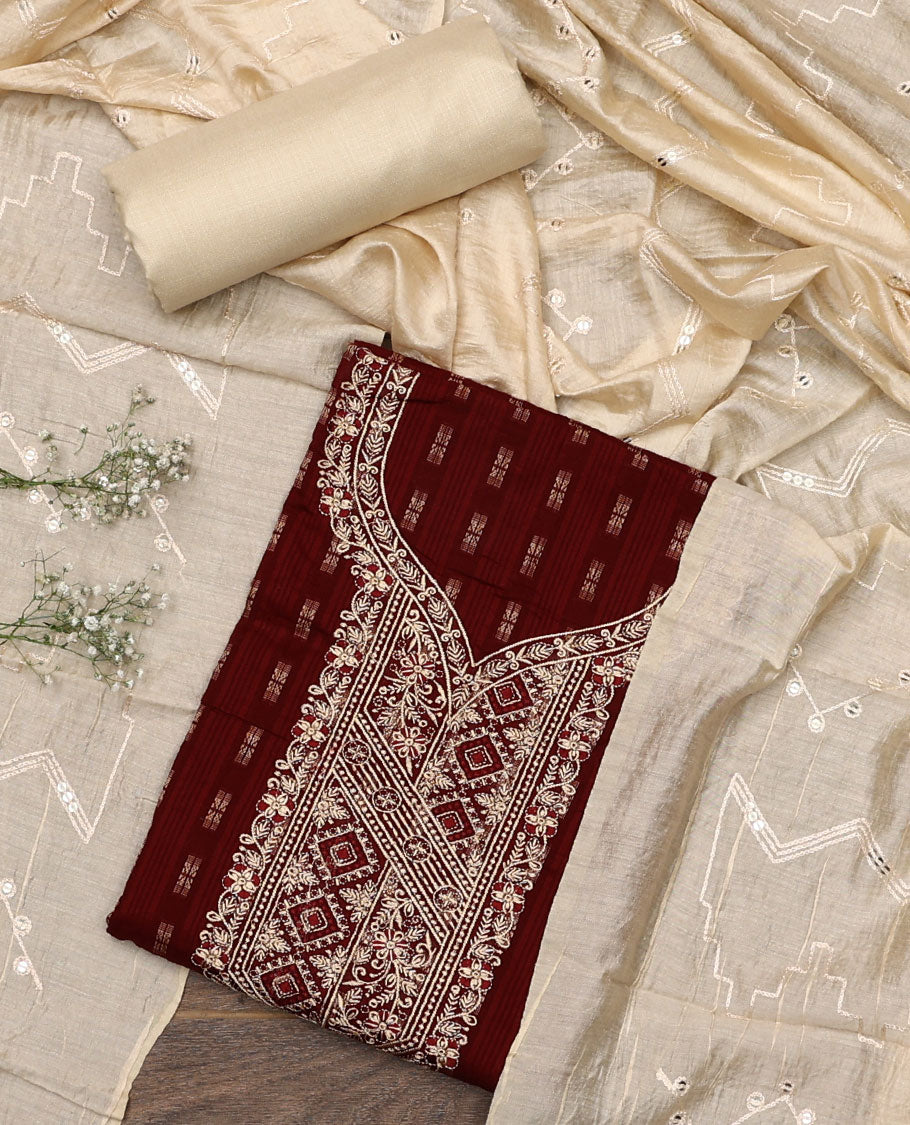 Maroon material chudidar set, buttas with neck embroidered top, contrast plain bottom, and thread and sequins embroidered dupatta