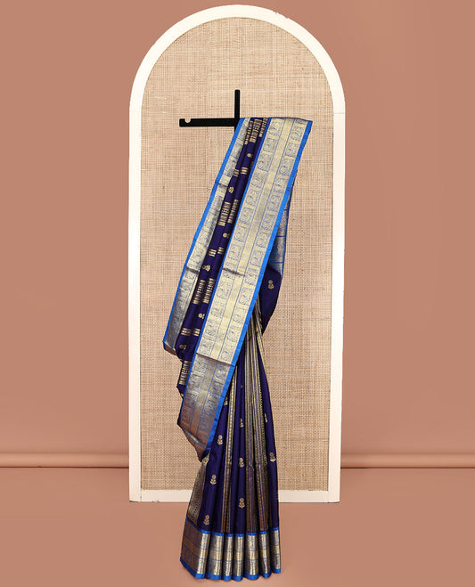 Navy Blue Venkatagiri Silk Saree, Detailed with Zari Designs All Over Its Body, Complemented by a Contrast Traditional Zari Border of Peacock Designs, Pallu of Peacock Designs, and Paired with a Contrast Blouse