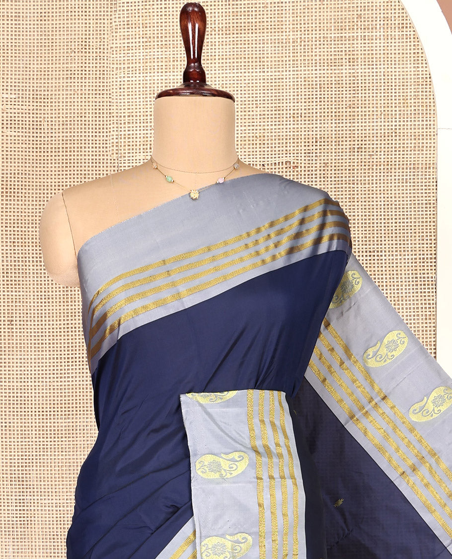 Navy Blue Aarani Gift Saree, Embellished with Buttas on Its Body, Complemented by a Contrast Border of Stripes and Paisley Designs, a Pallu of Stripes and Buttas, and Paired with a Contrast Blouse