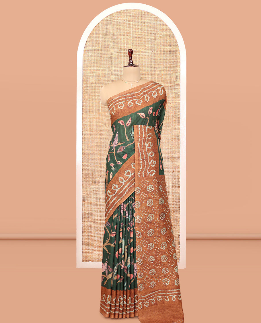 Green Fancy Tussar Saree Features Kalamkari Floral and Animal Print, Contrast Bandhani Border, Bandhani Pallu, and a Contrast Blouse