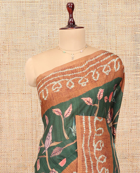 Green Fancy Tussar Saree Features Kalamkari Floral and Animal Print, Contrast Bandhani Border, Bandhani Pallu, and a Contrast Blouse