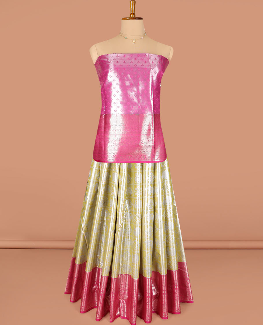 Yellow butta enclosed checked art silk half-saree, contrast traditional zari bordered skirt, contrast jacquard blouse and a contrast floral design dhavani