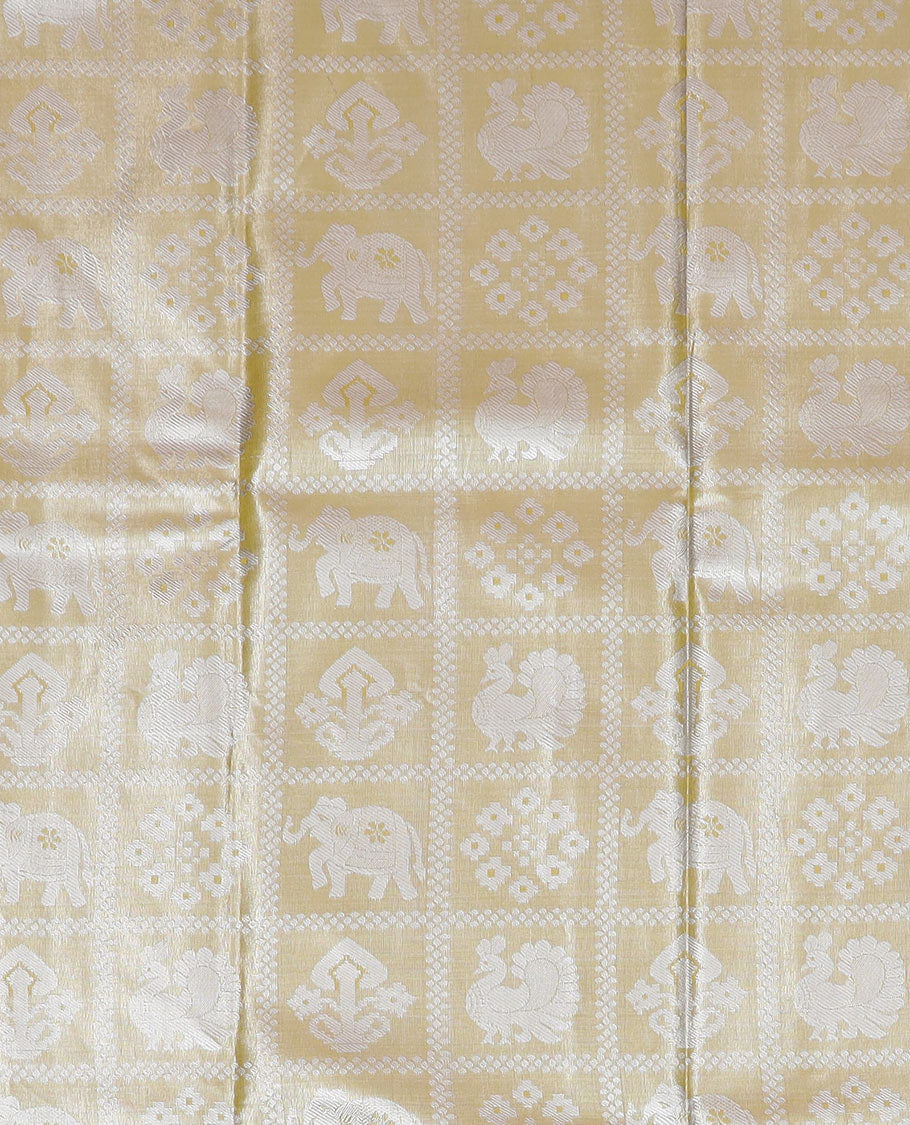 Yellow butta enclosed checked art silk half-saree, contrast traditional zari bordered skirt, contrast jacquard blouse and a contrast floral design dhavani