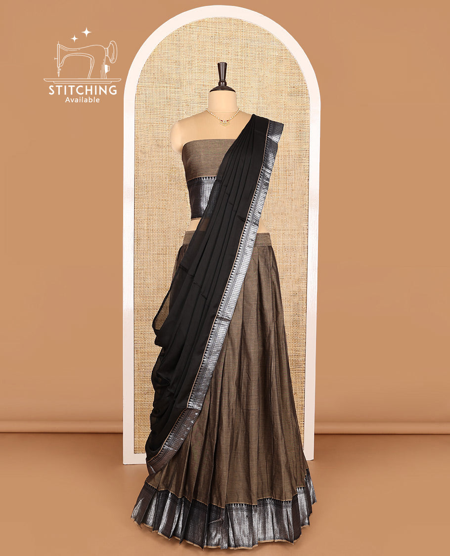 Pale Brown Cotton Half-Saree Featuring Plain Skirt, Complemented by Contrast Traditional Zari Design Border, Paired with a Matching Blouse, and Contrast Zari-Bordered Dhavani