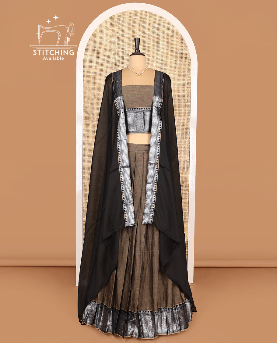 Pale Brown Cotton Half-Saree Featuring Plain Skirt, Complemented by Contrast Traditional Zari Design Border, Paired with a Matching Blouse, and Contrast Zari-Bordered Dhavani