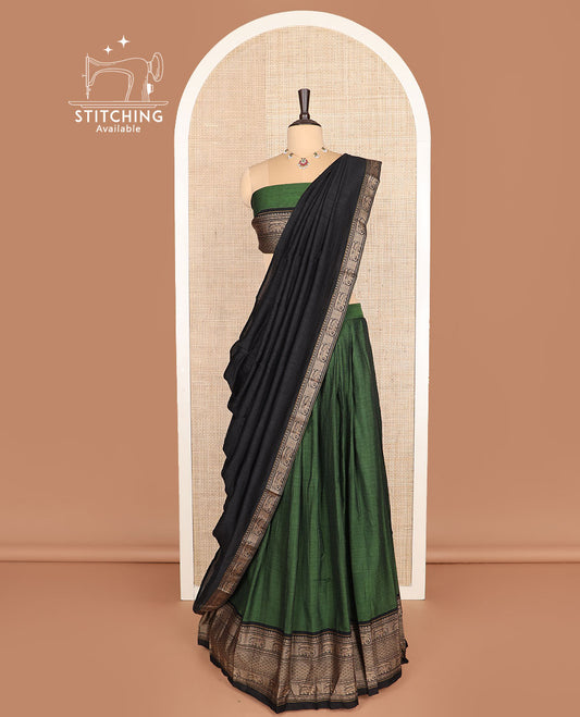 Green cotton half-saree, plain with contrast traditional motifs woven bordered skirt, matching blouse, and a contrast bordered dhavani