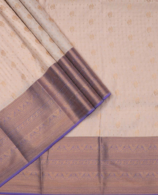 Cream art silk pavadai material, zari buttas with contrast traditional zari bordered skirt, and a contrast bordered blouse