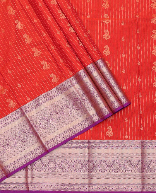Red Art Silk Pavadai Material Set, Beautified with Zari Designs on Its Skirt, Complemented by a Contrast Traditional Zari Design Border, and Paired with a Contrast Blouse