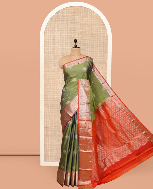 Green Budget Silk Saree, Bedecked with Zari Buttas, Complemented by a Contrast Traditional Chakram Zari Border, Jaal Pallu, and Contrast Blouse