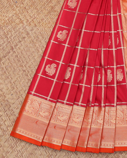 Red Budget Silk Saree, Enriched with Peacock Butta Enclosed Checks On Its Body, Complemented by Contrast Traditional Zari Designs Woven Border, Grand Pallu and Paired with a Contrast Blouse