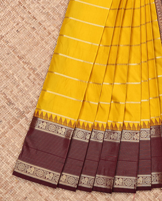Yellow Budget Silk Saree, Sparsely Threaded with Zari Stripes, Complemented by a Contrast Traditional Zari Temple Border, Grand Pallu, and a Contrast Blouse