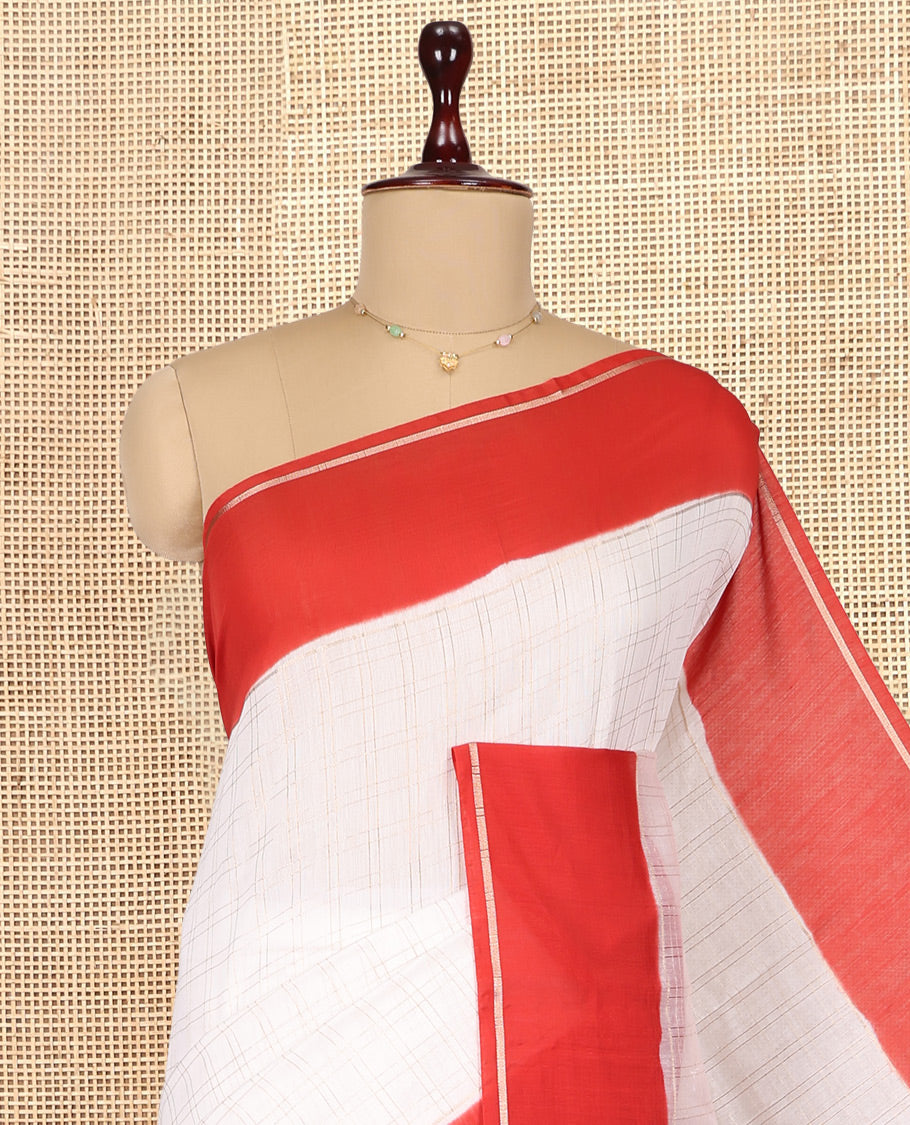 White Assam Silk Saree, Decked Up with Zari Checks, Complemented by Contrast Zari Border,  Zari Woven Pallu, and Contrast Blouse