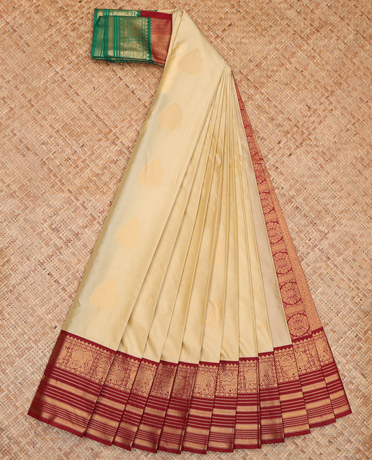 Sandal Budget Silk Saree, Accentuated with Zari Buttas, a Contrast Traditional Zari Ganga-Jamuna Border, Grand Pallu, and a Contrast Blouse