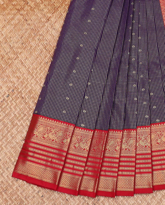 Blue zari buttas and micro-checked gift saree, contrast traditional zari border, and mat textured pallu